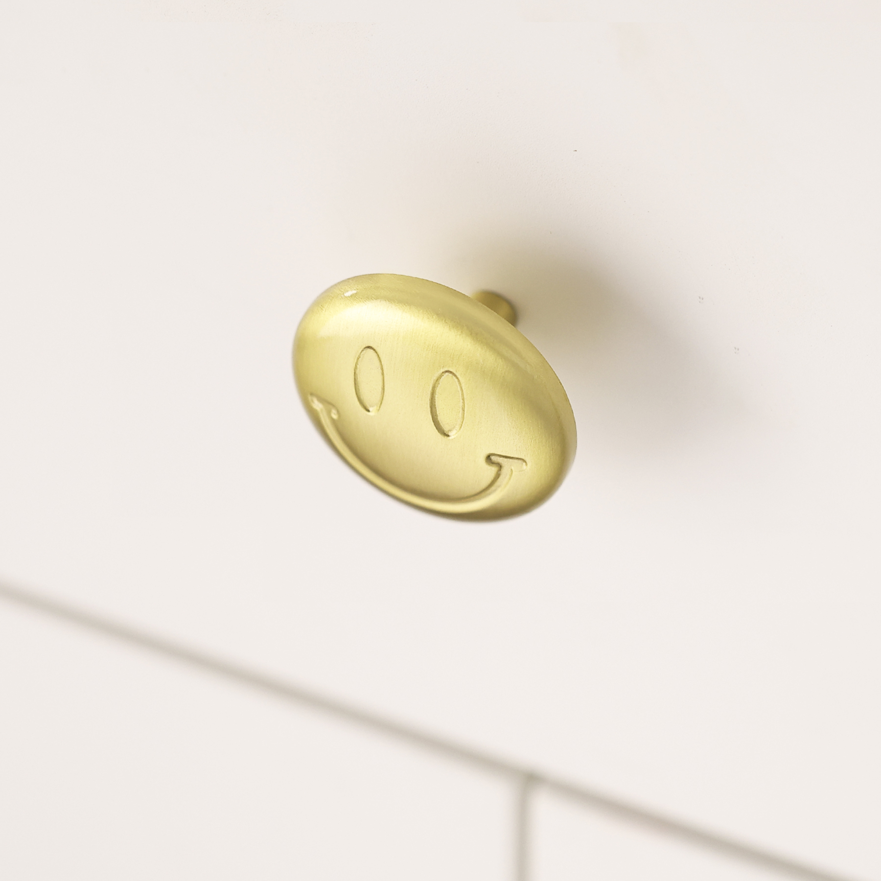 Smiley brass knob product view
